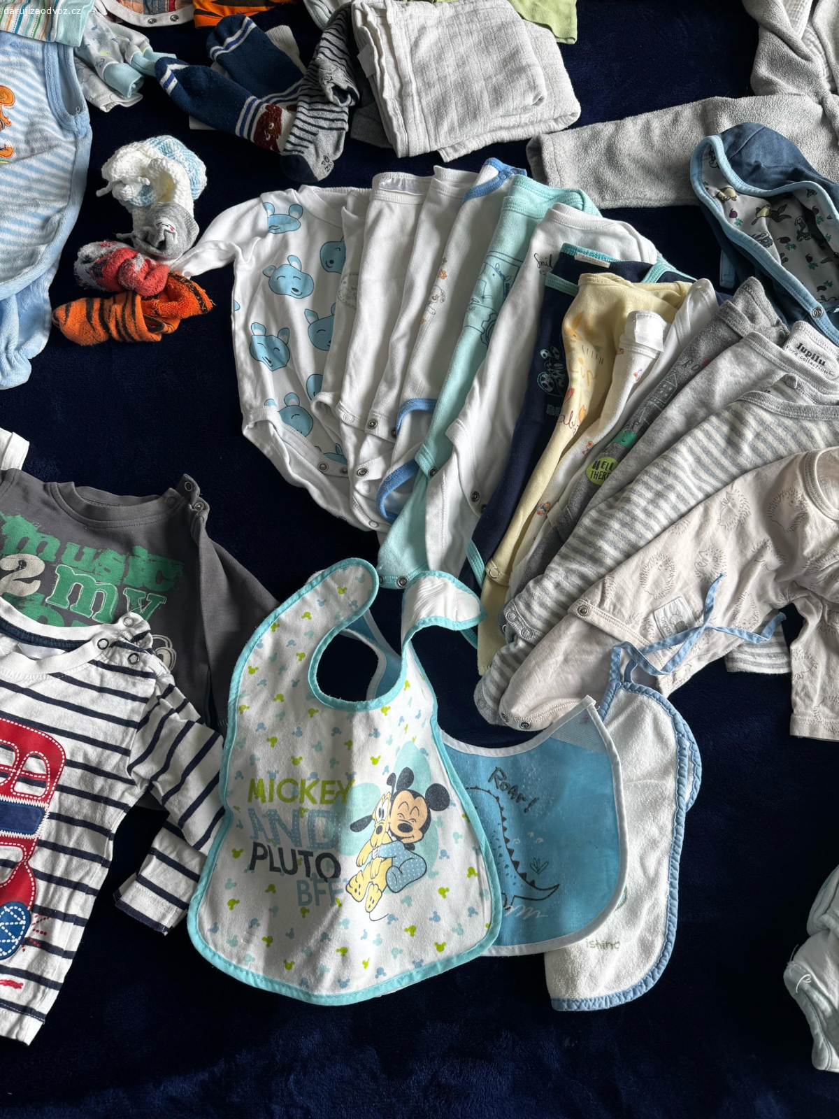 Balík dětského oblečení 52-68vel. vše co vidíte na fotce 
body s dl.i krát. rukavem, 
spací pytel
kalhoty, polštářky, pyžámka, punčochy, mikči, kraťasy, bridáčky, plíny, ponožky, trička,…
osobní předání - prosim si dvě coly zero anebo zásilkovna komplet se zabalením 150,-