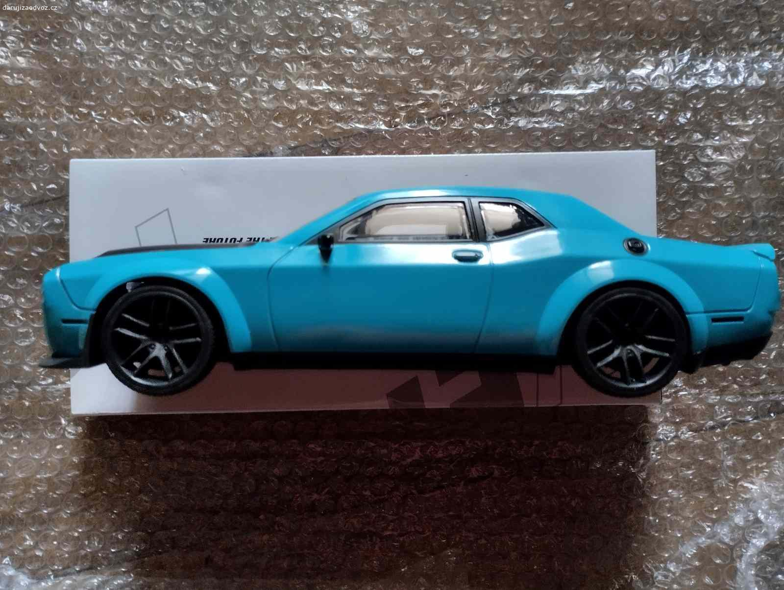 Dodge Challenger Widebody model. Daruji tento model za svezení v opravdovém challengeru v okolí Brna, moc by mě to potěšilo :-) Díky.